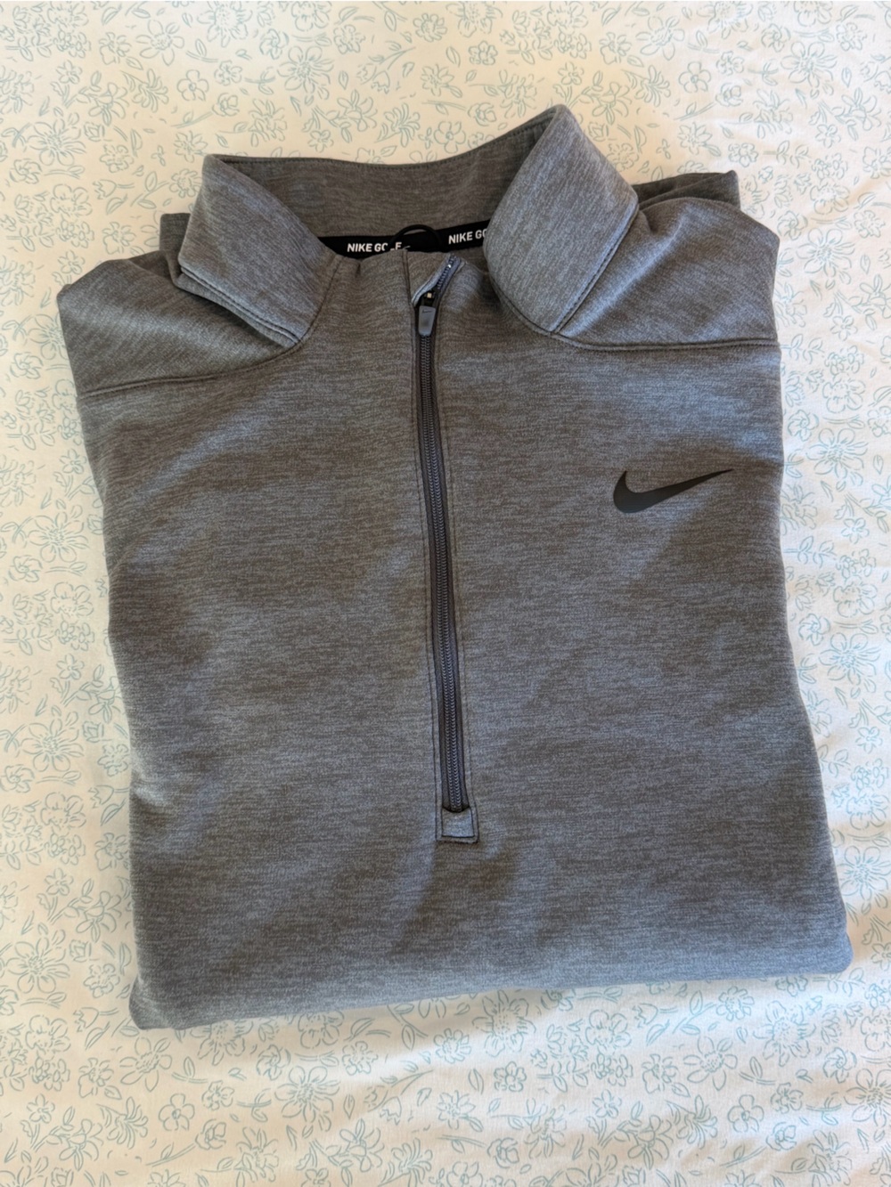Nike Golf Therma-FIT 1/2-Zip Victory Pullover
Heather Charcoal Gray- women’s- M